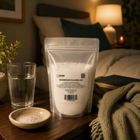 Magnesium Chloride USP on a bedside nightstand with a glass of water for an evening routine